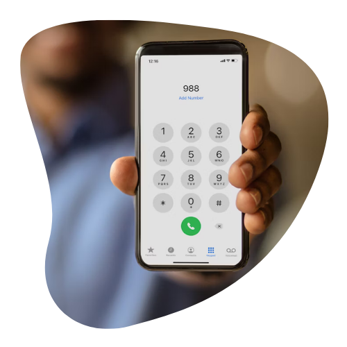 Person holding a phone with 988